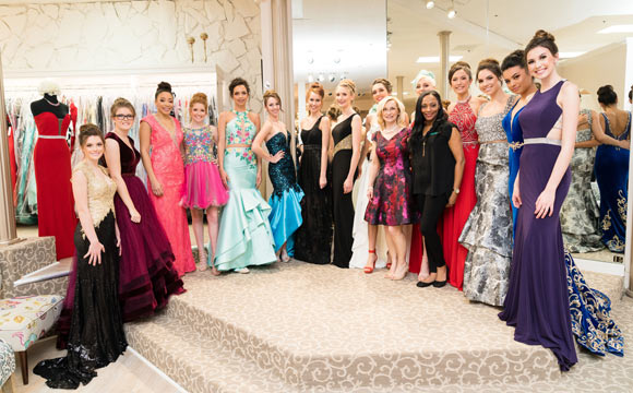 Group of girls in various prom dresses